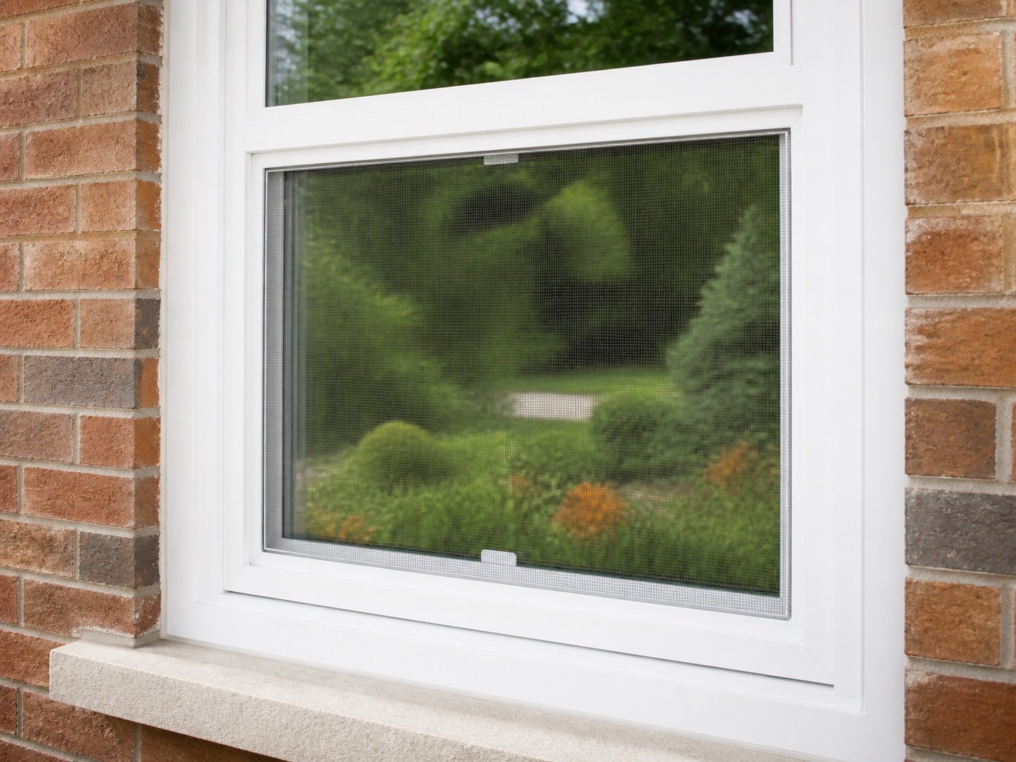 Completed window screen seated squarely in a white window