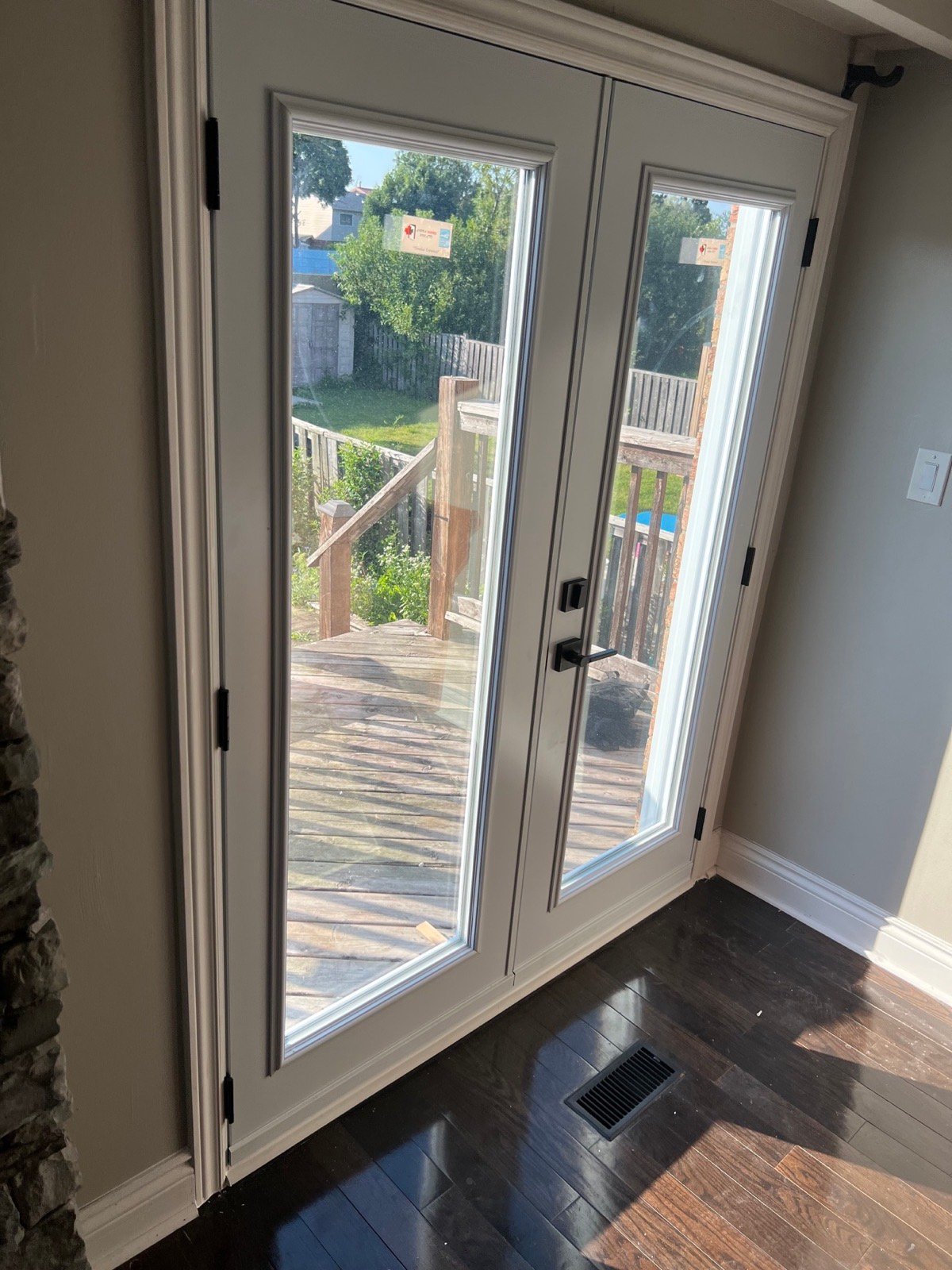 White French door viewed from inside the Brampton home