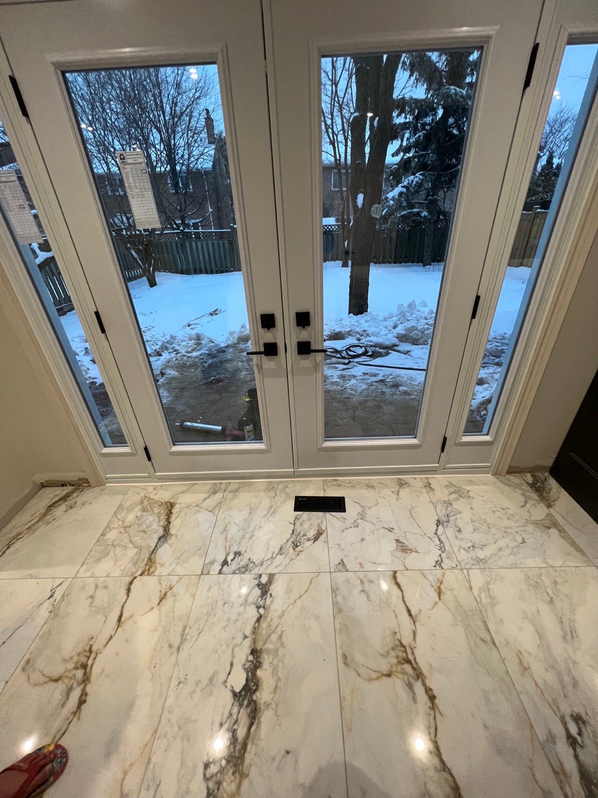 White French double doors with sidelites viewed from a Mississauga interior